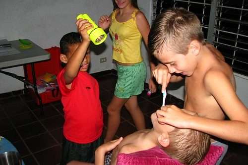 Kids are Brushing Teeth of one Boy