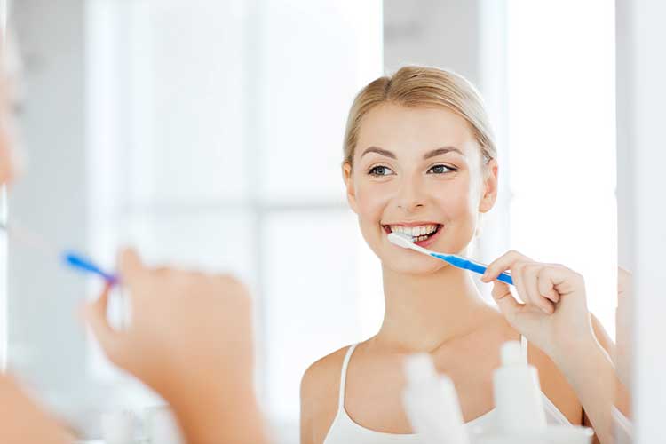Girl is Brushing Her Teeth
